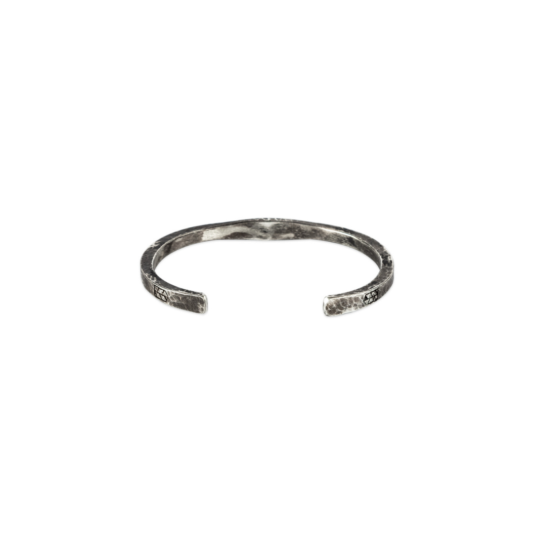 Artisan crafted Wave cuff - Scars - Bleu Nomade Made in Italy following traditional jewelry techniques.